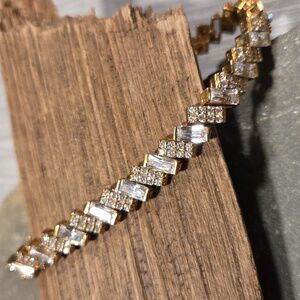 STERLING SILVER And CZ TENNIS BRACELET.  GOLD ELECTOPLATED
